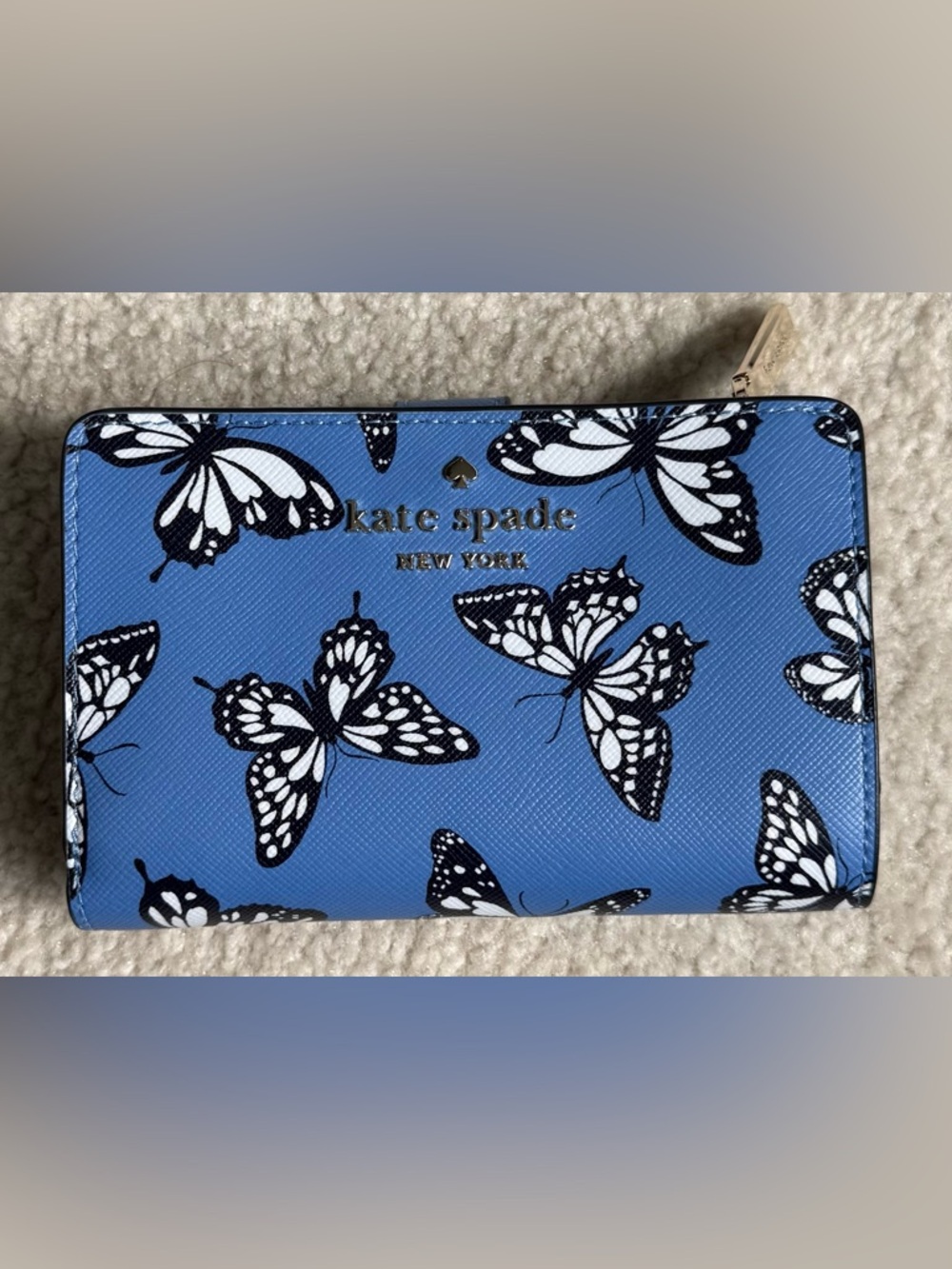kate spade blue butterfly zip-around wallet